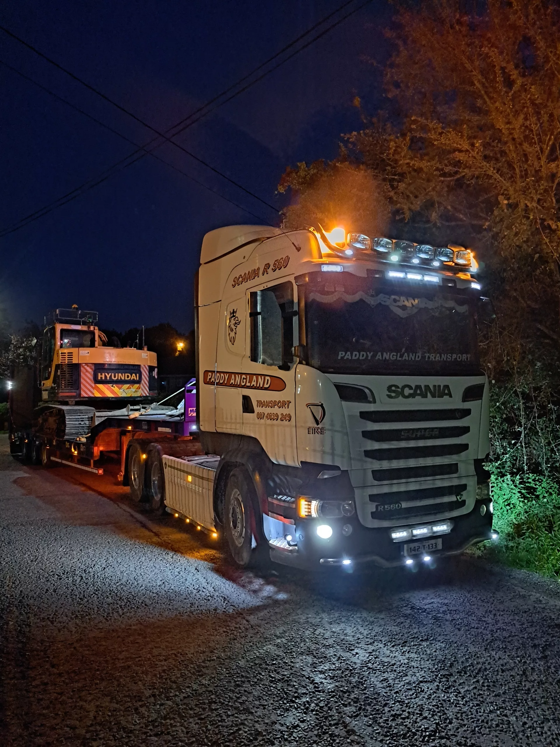 Artic Truck with Low Loader towing a 14 Tonne Hyundai Excavator from Cork City to Kilkenny City